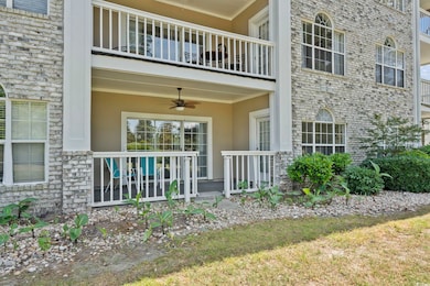 View of exterior entry featuring a ceiling fan, st