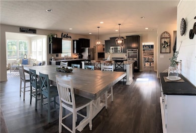 Large Cafe Area for Dining that opens up to the Kitchen & Great Room! 