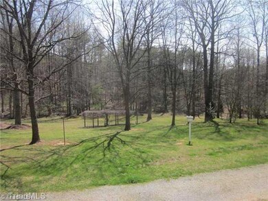 Other. View of back yard and grape vines from deck. Seller planted every tree when he purchased the property in 1977.