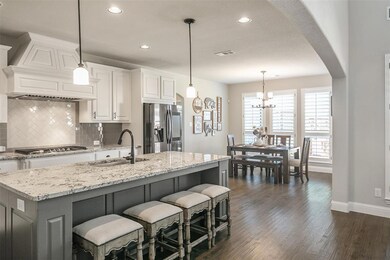WOW!!  Gorgeous granite and a huge island for ente