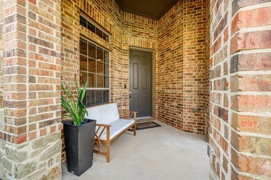 Inviting front entry with covered front porch.