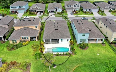 Rear Aerial View showcasing Pool and Outdoor Kitch