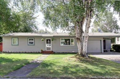 Front of House with Large Tree