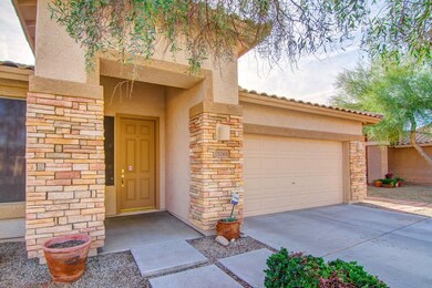 Front Door and 2-Car Garage
