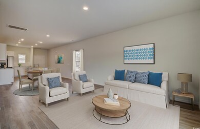 Living room featuring light hardwood / wood-style 