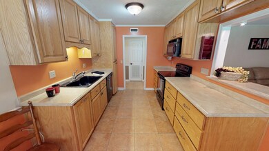 Kitchen with lots of cabinets & drawers