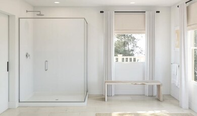 Primary bath with glass shower enclosure