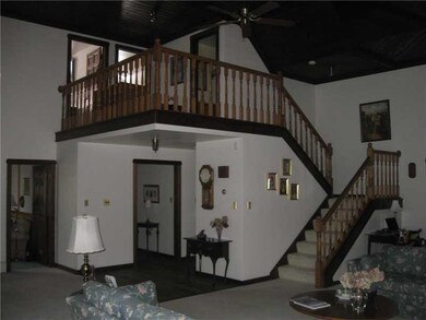 Living Room. Living Room With View of Staircase