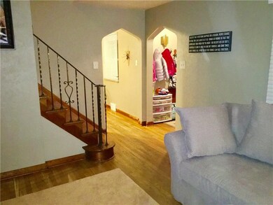ENTRY AND BEAUTIFUL HARDWOOD FLOORS