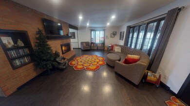 225-W-Ave-B-Living room from laundry1201