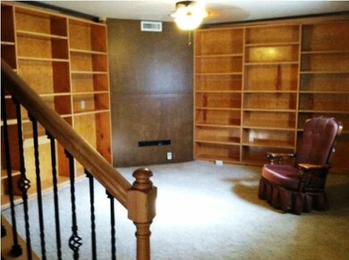 COZY LIBRARY WITH SPACE FOR A FIREPLACE
