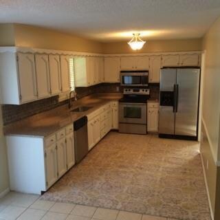 409 N Madison St, Raymore, MO 64083 - photo 7