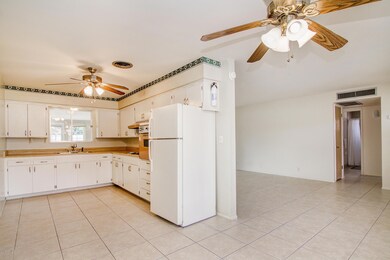 Dining to Kitchen and Living