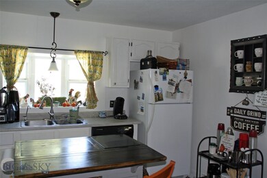 Bright friendly kitchen invites good friends to st