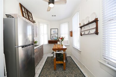 Kitchen with views of  cruise ships in port.