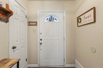 Foyer with a textured wall