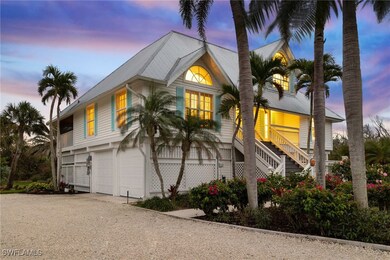 Property exterior at dusk featuring stairway, meta