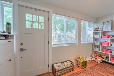 New door with finished entryway and barn door to l