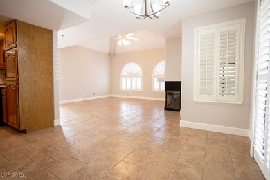 Unfurnished living room with ceiling fan with nota
