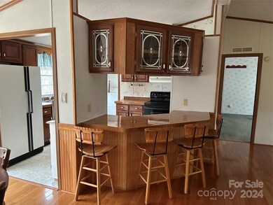 Breakfast bar looking into the kitchen