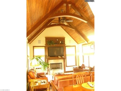 Family Room features a New England style beamed wo