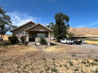 View of front facade featuring covered porch