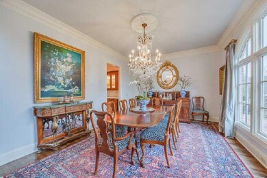 Spacious formal dining room leads through the butlers pantry into the well equipped kitchen.