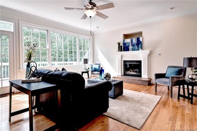 The great room offers a gas fireplace and features