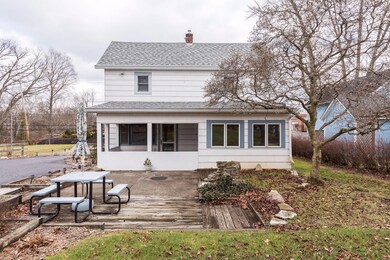 Rear View w/ Back Porch and Patio.