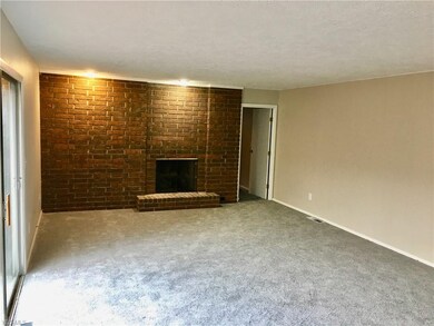 Beautiful large living room with gas fireplace and