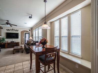 Eat-in kitchen that is open to family room.  Notic