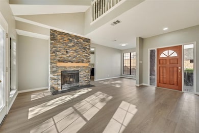 Designer vinyl plank flooring throughout living ro