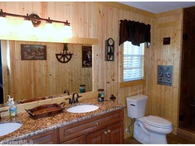 Master Bath/Spa. Also completely updated, the master bath has a double, adult height vanity with level 2 granite.