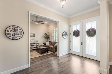 FOYER WITH ACCESS TO THE OFFICE/ DEN