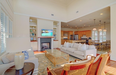 Open to kitchen and dining room