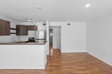 The living area and kitchen flow together seamless