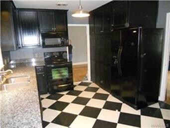 Great kitchen with tile floors and granite counter