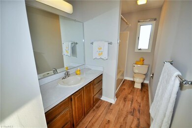 Second bathroom with new flooring.