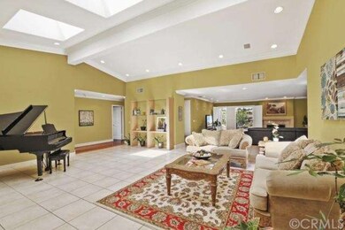 Soaring ceilings w/ three custom skylights for nat