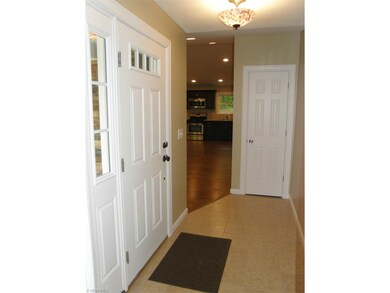 Spacious foyer w/tile floor & coat closet