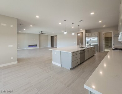 Kitchen with open floor plan, stainless steel appl