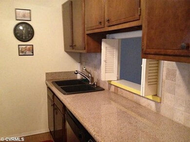 Kitchen - Updated galley kitchen with pass through