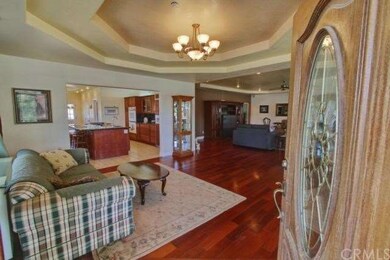 Elegant/Formal Entry featuring coffered cieling, t