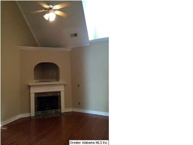 Great room with hardwood flooring, gas log firepla