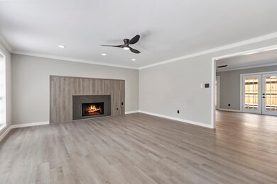 Large living room with gas fireplace.