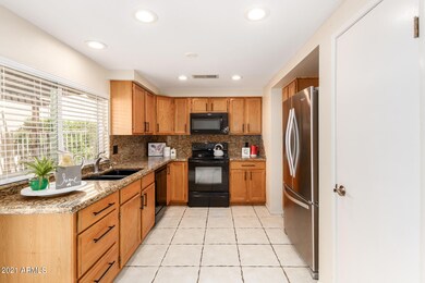 OVERSIZED WINDOWS IN KITCHEN