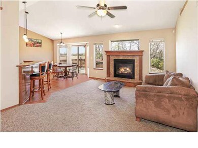 Living Room view with kitchen and dining area