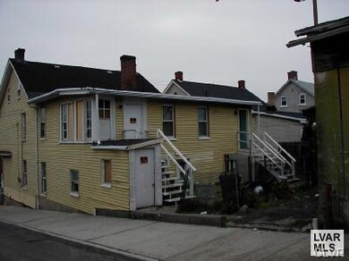 rear view of two 2nd floor apartments