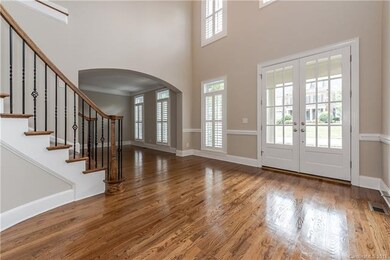 Foyer with hardwood flooring