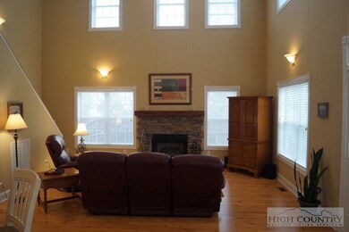 Living Room: Beautiful stone fireplace, vaulted ce
